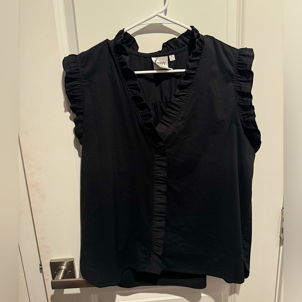 Finley black top with ruffle sleeves. Size Large.